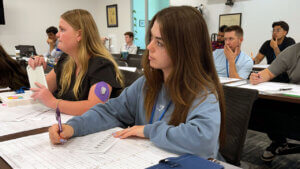 Beginning Design School Student watching instructor