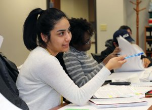 Fire sprinkler student points with a pen